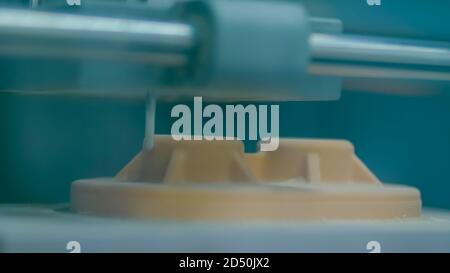 Automated milling machine cutting wooden workpiece from wood pulp, making 3d model at technology exhibition, factory - close up. Woodworking, CNC Stock Photo