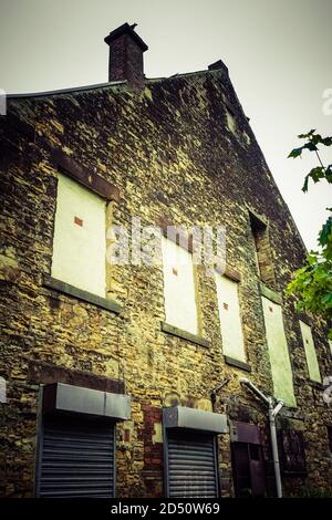 Sinister abandoned and boarded up old bulding in Consett, County Durham, UK Stock Photo