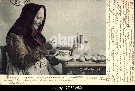 Frankreich, Alte Frau in Tracht, Bäuerin, Teetasse, Hauskatze | usage worldwide Stock Photo
