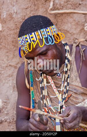 Portrait of a Hadza hunter. The Hadza, or Hadzabe, are an ethnic group in north-central tanzania, living around Lake Eyasi in the Central Rift Valley Stock Photo