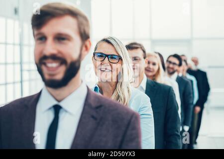 close up. group of frustrated employees standing in the office. Stock Photo