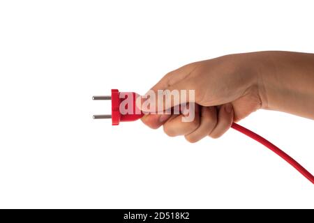 Hand hold electric power plug isolated on white background. Red cable, electronics. Stock Photo