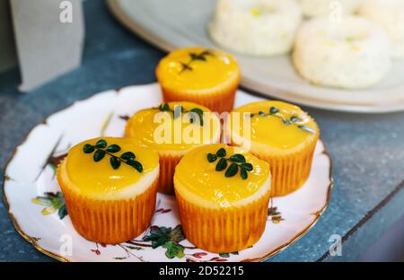 Lemon cupcakes with lemon green leave, group of bakery cupcake and other cake, selective focus Stock Photo