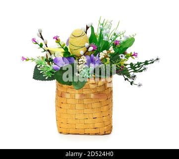 Easter basket from a flower arrangement on white background Stock Photo