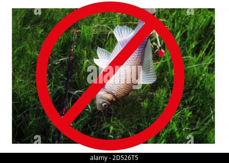 Ban on fishing, prevention of poaching. Crossed out sign with a fish in his hand. Prohibiting the concept of fishing. Stock Photo