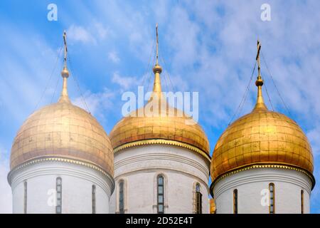 Domes of the Assumption Cathedral on a sunny sky background - Kremlin, Moscow, Russia in June 2019 Stock Photo