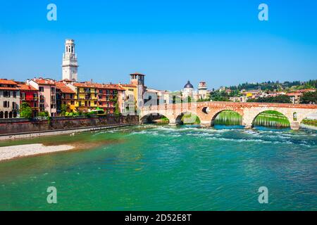 Ponte Pietra bridge is a Roman arch stone bridge crossing the Adige River in Verona, Veneto region in Italy Stock Photo