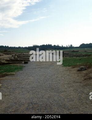 Spain, Catalonia, Alt Emporda, Girona province, Empuries. Cardo Maximus (1st century BC-2nd century AD). Panoramic view of which was one of the two main streets that crossed the city (North-South). On both sides, archaeological remains of commercial establishments. Stock Photo