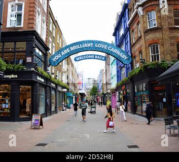 Welcome Back sign at Carnaby Street, London, as shops reopened after the lockdown in 2020. Stock Photo