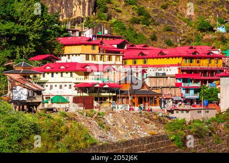 MANIKARAN, INDIA - OCTOBER 02, 2019: Colorful local houses in Manikaran village in Parvati valley, Himachal Pradesh state in India Stock Photo