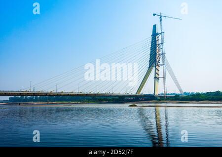 NEW DELHI, INDIA - OCTOBER 06, 2019: Signature Bridge is a cantilever spar cable stayed bridge through the Yamuna river in New Delhi, India Stock Photo