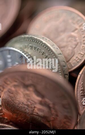 Close-up of old British coins, including a one pound coin which is no longer legal tender Stock Photo