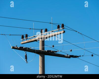 Close up on high voltage transmission pylon Stock Photo