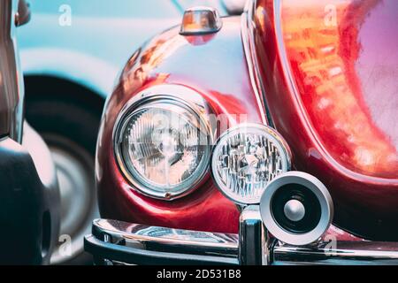 Close Up Headlight Of Old Retro Vintage Red Color Car Stock Photo