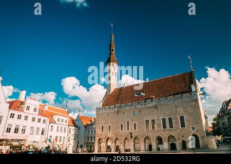 Tallinn, Estonia. Famous Old Traditional Town Hall Square In Sunny Summer Evening. Famous Landmark And Popular Place. Destination Scenic Stock Photo