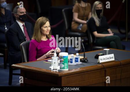 Washington, United States. 12th Oct, 2020. Supreme Court nominee Judge Amy Coney Barrett attends her confirmation hearing before the Senate Judiciary Committee, on Capitol Hill in Washington, DC, Monday, October 12, 2020. The hearings are expected to last four days. If confirmed, Barrett will replace Justice Ruth Bader Ginsburg, who died last month. Pool photo by Caroline Brehman/UPI Credit: UPI/Alamy Live News Stock Photo