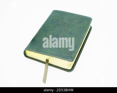 Green leather bound bible isolated on white background Stock Photo