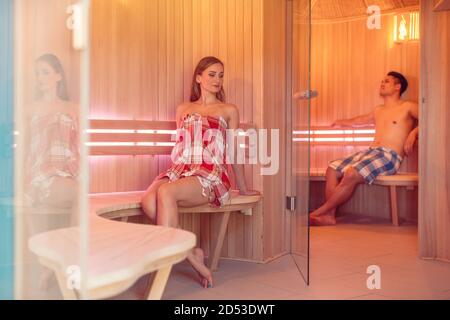 Woman and man in the sauna Stock Photo