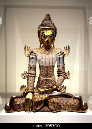 Crowned Buddha statue. 19th cent. Burma ( Myanmar). Gold lacquered wood with glass inlay. Museum of World Cultures. Barcelona. Spain. Stock Photo