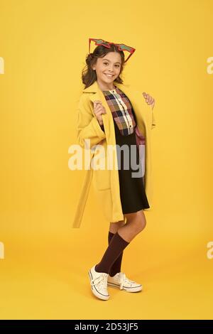Become popular. Celebrity child. Star concept. Fame and popularity. Popular schoolgirl. Carnival costume famous celebrity. Cheerful girl wear eyeglasses. Cool kid celebrity. Dreaming about fame. Stock Photo