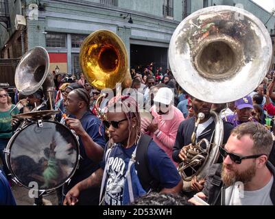 New Orleans, Louisiana, USA - 2020: People participate in a Second Line parade, a traditional event of this city. Stock Photo