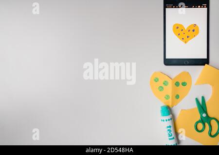 tablet distance learning flat lay with school supplies Stock Photo