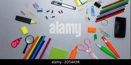 Material for school, paper clips, pencils, colors, scisor and notebook Stock Photo