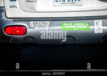 Reston, USA - August 30, 2020: Run ultras not your mouth and make America green again bumper stickers from Sierra Club on car Stock Photo