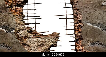 Isolated photo of destroyed concrete wall with rusty metal parts and copyspace on white background. Stock Photo