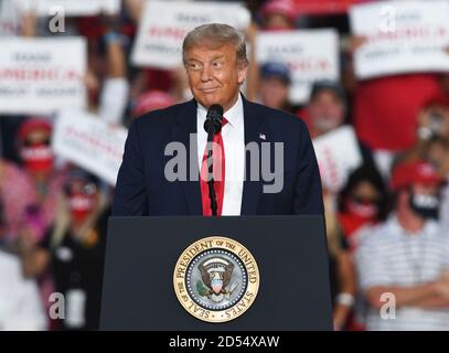 Sanford, United States. 12th Oct, 2020. U.S. President Donald Trump speaks at a Make America Great Again rally, his first campaign rally since contracting COVID-19, at Orlando Sanford International Airport. Credit: SOPA Images Limited/Alamy Live News Stock Photo
