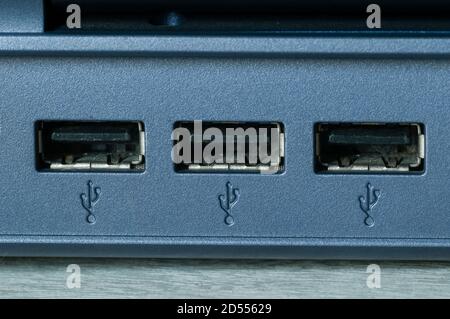 Detail of three computer USB ports Stock Photo