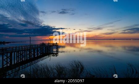 October sunset on Mobile Bay, Alabama Stock Photo