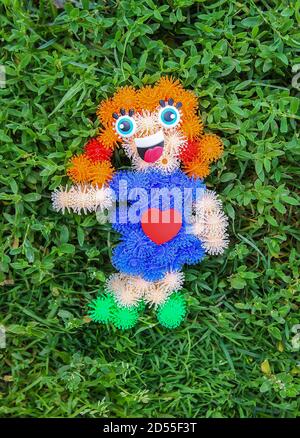 Colorful sticky handmade funny toy made by child. Stock Photo