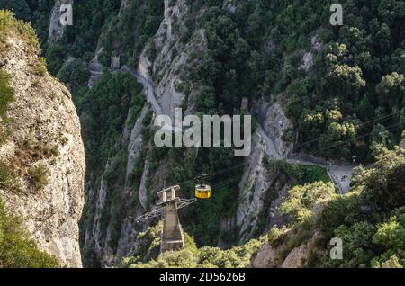 Montserrat mountain rocks and monastery near Barcelona. Rope Train Stock Photo