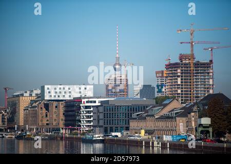 Berlin, Germany. 13th Oct, 2020. Behind the construction of high-rise buildings, the Berlin television tower can be seen. Credit: Christophe Gateau/dpa/Alamy Live News Stock Photo