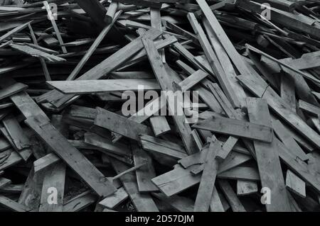 Pile of wood planks abstract background. Broken wooden boards. Stock Photo