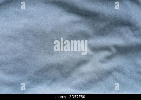 Blue color fabric texture background, close up. Top view, copy space. Stock Photo