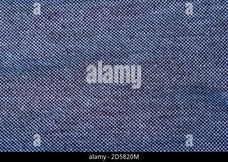 The texture of a dark gray fabric made of pure cotton. The concept of an expensive and high-quality product. Stock Photo