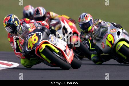 Macadam Siege is Valentino Rossi of Italy (46) on the way to winning the 250cc Australian  Motrorcycle Grand Prix at Phillip Island October 3. Second was Olivier  Jacque (19) of France with Tohru Ukawa of