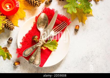 Autumn table setting top view at white table. Stock Photo