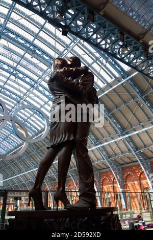 'The Meeting Place' bronze sculpture by Paul Day at St Pancras International railway station, London, United Kingdom