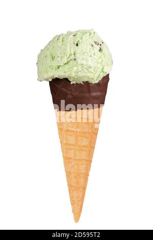 Mint choc chip ice cream in a chocolate dipped cone. Stock Photo