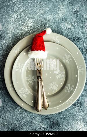 Gift box on a place setting at Christmas Stock Photo