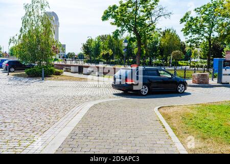 Driving school (SCOALA) car Volkswagen Golf on a cobblestone street in Alba Iulia, Romania, 2020. Stock Photo