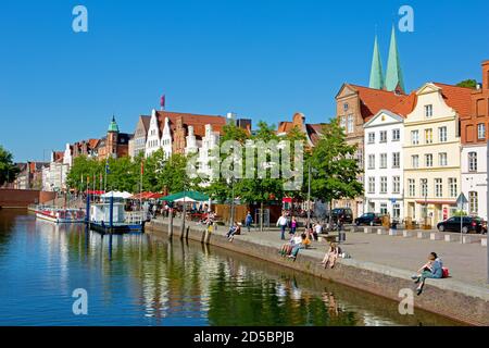 Germany, Schleswig-Holstein, Hanseatic City of Lübeck. View of the Obertrave with old town houses. Stock Photo