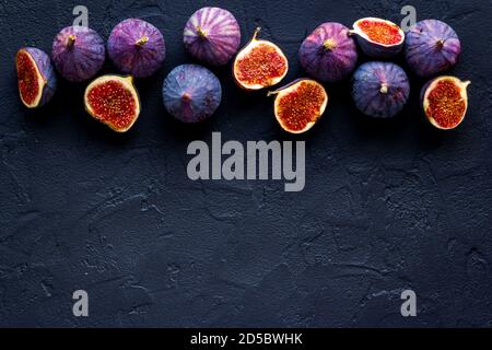 Flat lay of figs on a kitchen table, top view Stock Photo
