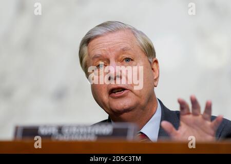 Committee Chairman Sen. Lindsey Graham, R-S.C., listens during the ...