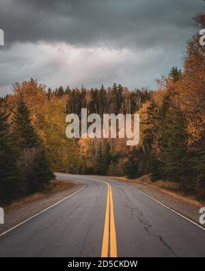 Autumn color on a road near Rangeley, Maine Stock Photo