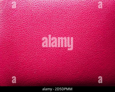 Red elegance leather texture for background with visible details.Pink leather texture background.grunge leather background, ough genuine camel leather. Stock Photo