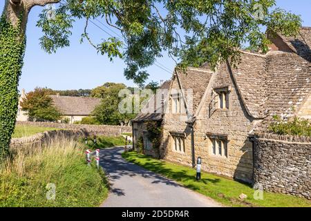 Old stone cottages at Barton near the Cotswold village of Guiting Power, Gloucestershire UK Stock Photo